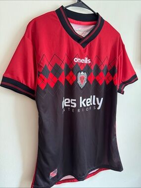 O'Neills Red and Black Sports Jersey with Argyle Detail